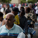 Residents line up to fill containers with water in Cape Town, South Africa. Photo: AP
